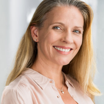 Portrait of mature woman Duluth Dental Studio patient care