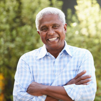 Smiling senior African American man Dental Care for SeniorsDuluth